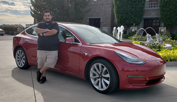 Paolo with his Tesla