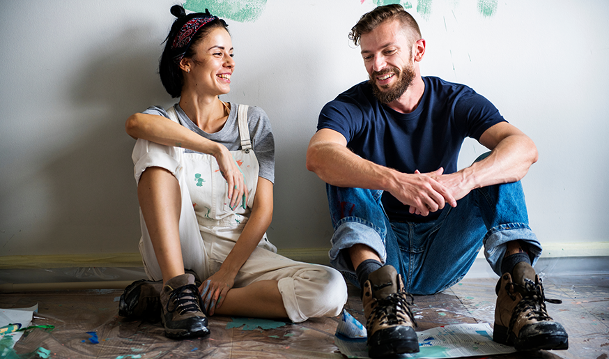 A couple works on their home remodel