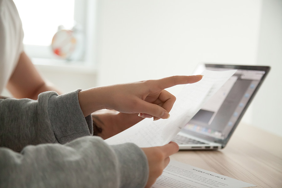 couple using computer to manage finances