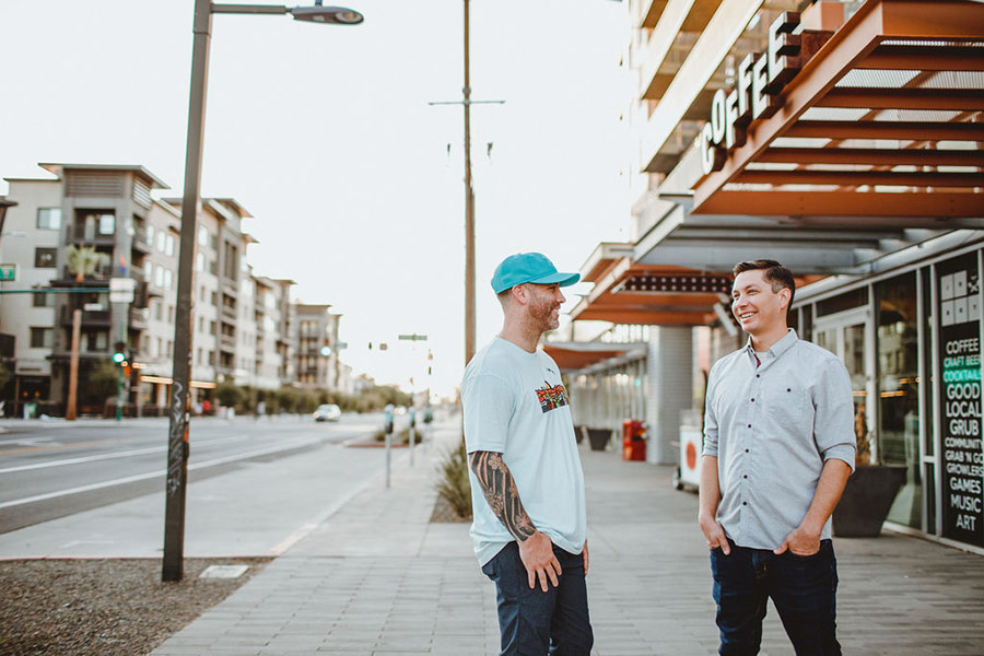 Mike talking to Thomas on the sidewalk in Phoenix, AZ