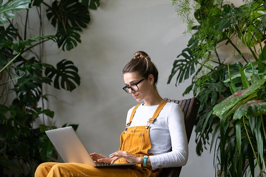 young professional woman managing her finances online