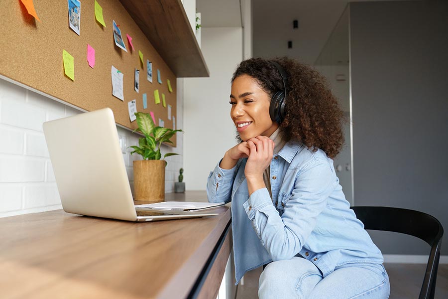 Young woman coming up with a plan to pay off her student loans as she prepares to graduate from college.