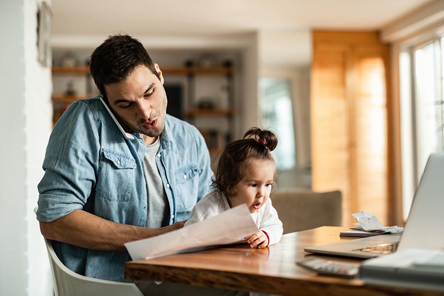 stay at home dad juggling parenting and finances