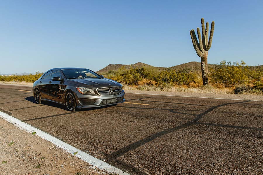 Driving Refinanced Car In The Desert.