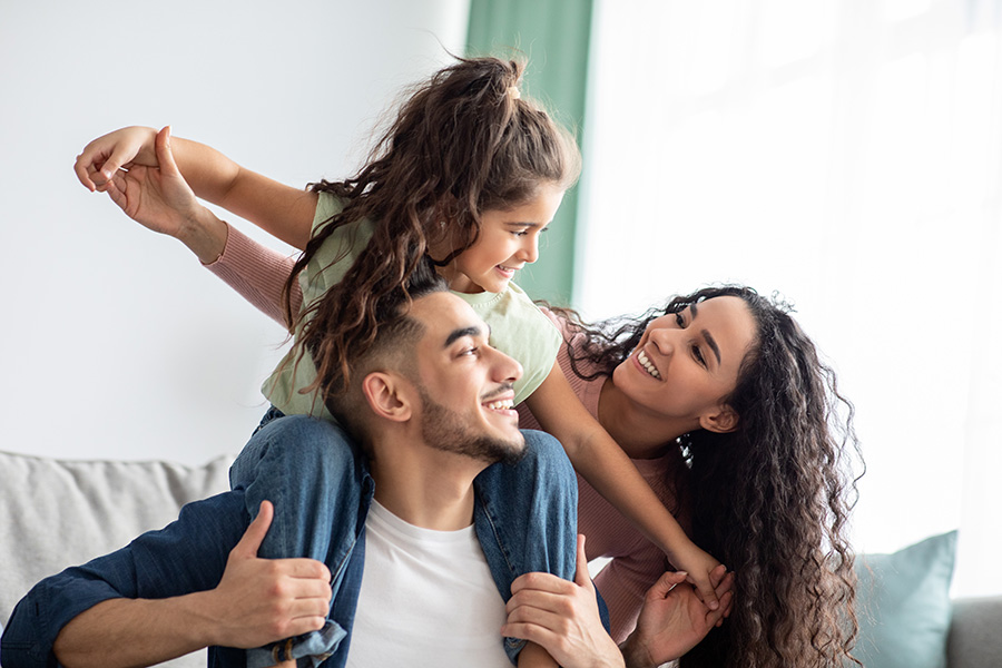 Family of three. Learn how to prioritize your savings goals when you're just starting out.