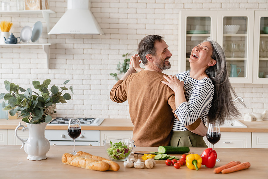 mature couple dancing enjoying retirement