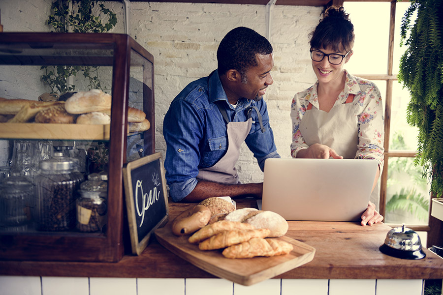 A couple working at a small bakery business. How does a business line of credit work for a small business in Arizona?